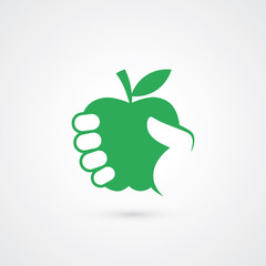 Hand holding apple sign