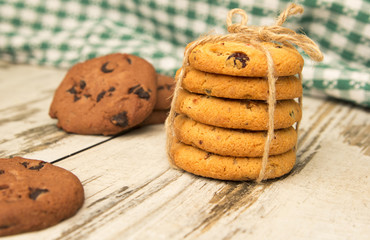 Chocolate chip cookies on grey wooden background