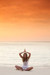 Fototapeta na wymiar Yoga at sunset