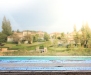 Obraz na płótnie Canvas Table Top And Blur Building Of Background