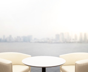 Table Top And Blur Building Of Background
