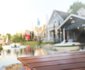 Table Top And Blur Building Of Background