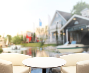 Table Top And Blur Building Of Background