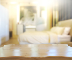 Fototapeta na wymiar Table Top And Blur Background In Bedroom