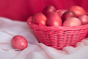 Easter pink eggs in basket