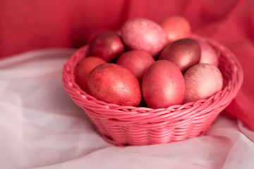 Easter pink eggs in basket