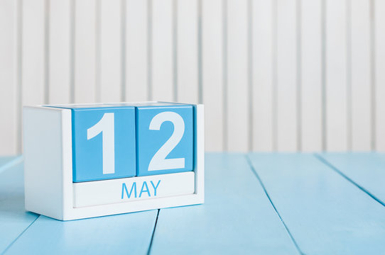 May 12th. Image of may 12 wooden color calendar on white background.  Spring day, empty space for text. International Nurses Day