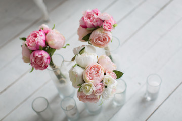 pink white flowers in vases