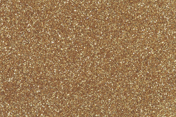 Golden glitter texture christmas background.  Low contrast photo
