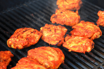Tandoori style chicken on the grill