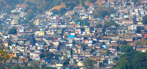Fototapeta na wymiar Lot of poor houses in Mumbai slums