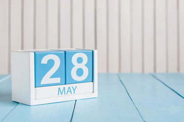 May 28th. Image of may 28 wooden color calendar on white background.  Spring day, empty space for text