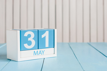 May 31st. Image of may 31 wooden color calendar on white background.  Last spring day, Spring end. Empty space for text. World blondes Day