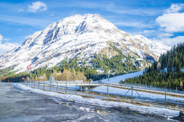 Mountain road in a sunny day (Swiss alps).