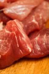 Pieces of fresh raw meat close-up