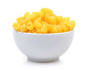 dry macaroni in the white bowl on white background