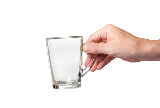 glass cup in hand isolated on white background