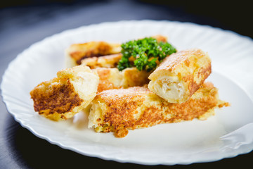 Rolls of cheese and bread, a dish in cafe