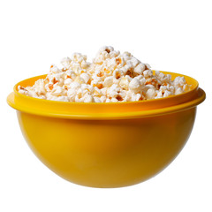 popcorn in a yellow bowl on white background