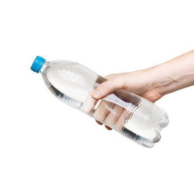 bottle of water in hand isolated on white background