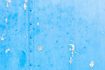 Blue grungy steel texture background with five old rivets and pe