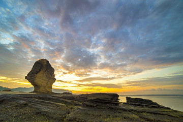 Fototapeta na wymiar Sunrise at Batu Payung (Umbrella Rock) at Lombok, Indonesia
