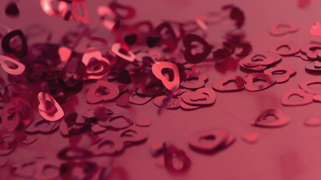 Valentine's Day confetti falling, slow motion