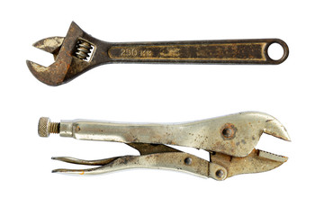 Old rusty Adjustable wrenches, spanners isolated on white.
