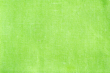 Blur abstract background. Green cotton fabric pattern