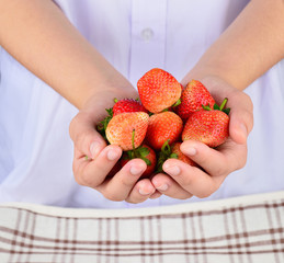 fresh red stawberry on hand
