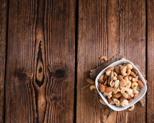 Fototapeta na wymiar Portion of mixed nuts (roasted and salted)