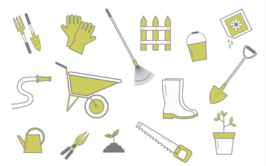 Spring garden background with variety of garden tools placed in random order
