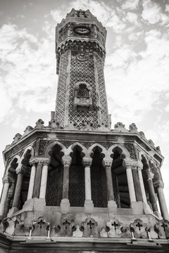 Izmir. Historical clock tower under cloudy sky