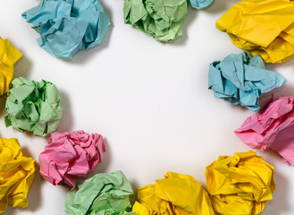 Many crumpled paper on the table with empty space for text