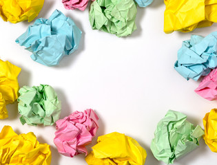 Many crumpled paper on the table with empty space for text