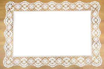 White openwork lace   on wooden background