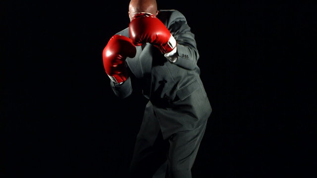 Boxing businessman, slow motion