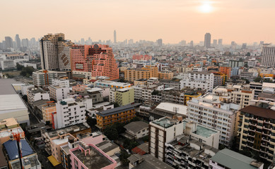 Naklejka premium Buildings in city and sunset_02