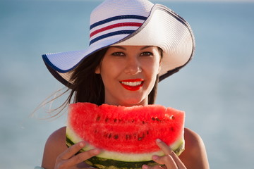 brunette woman watermelon sea