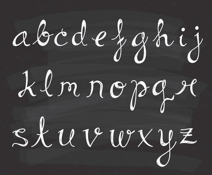 Set of script alphabet on chalkboard background