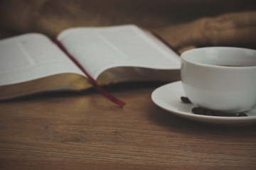 Coffee cup against a rustic background