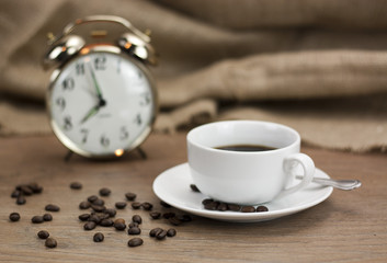 Coffee cup against a rustic background