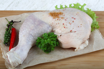 Raw chicken leg
