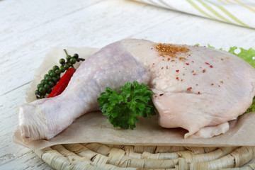 Raw chicken leg