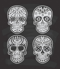 Set of sugar skull on chalkboard background