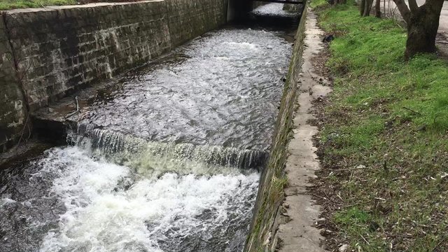 Slack water on the river rushes through the stone of the riverbed