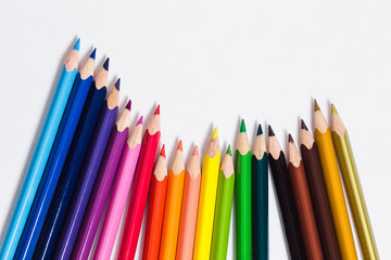 Colored pencils on white background