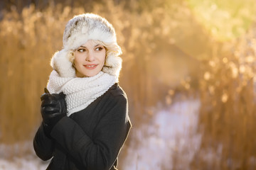 mysterious girl in a winter evening Park