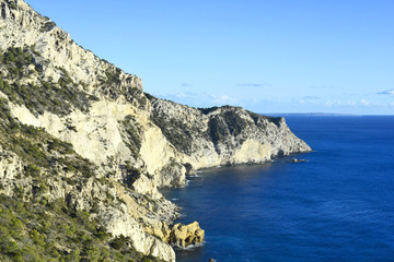 Fototapeta na wymiar Cliff coast and blue sea
