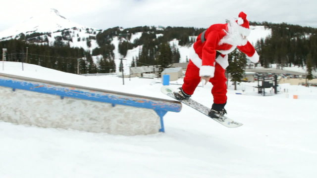 Santa Claus shredding in snowboard park